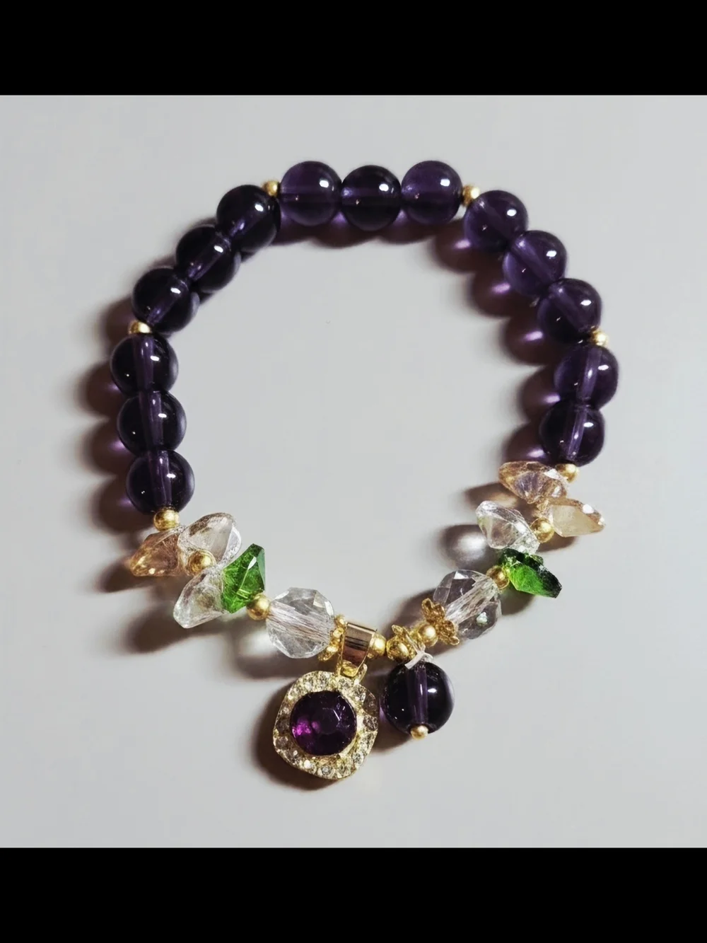 Amethyst Beaded Charm Bracelet with Gold Accents and Green Highlights